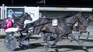 Gavin Lang and Yankee Rockstar round up Ohoka Punter and Beautide to win the 2016 Jet Roofing Kilmore Pacing Cup.