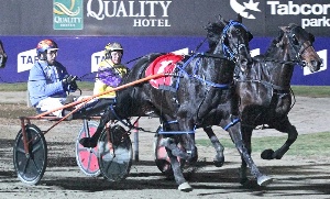Tim McLean and Exciteusinthecity winning the Alabar Captain Sandy Free for All last night at Tabcorp Park Melton. 