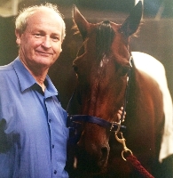 The late Danny Bergan with his beloved pacer Nukemjake.
