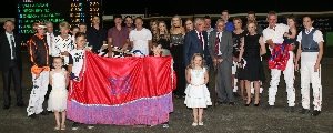 The presentation for the 2016 Shirley Turnbull Memorial won by KerryAnn Turner and her pacer Aztec Bromac.