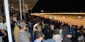 The crowd watches the action at Ballarat and District Trotting Club. 