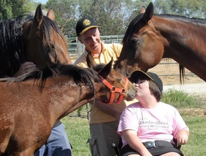 Sydney Weaver meets a few new friends at Alabar Farms.