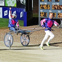 Jason Fino runs and Nathan Fino drives in the Good Friday Appeal Sulky Race of 2015. 