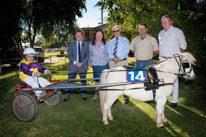Mini Trot driver Mason Muscat with HRNSW CEO John Dumesny, Chair of the Tamworth HRC Julie Maughan, HRNSW Board Member Chris Edwards, Greg Townsend Deputy President Tamworth P & A Association and Col Murray Mayor of the Tamworth Regional Council.