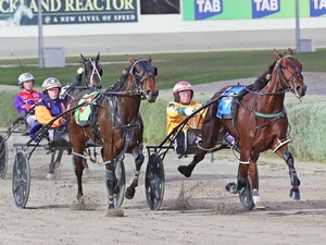 Molly Kelly (right) and Nostra Beach battle it out in the APG semi-final at Melton.