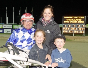 Chris, Alison, Katie and Sam Alford after Chris's 6000th winner, Diamond Grace, at Tabcorp Park Melton. 