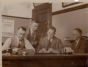 Ron Percival (standing) going through nominations for the 1936 Inter Dominion with the WATA's Handicapper and Chairman of Stewards