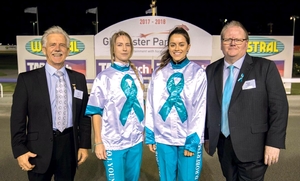 Bob Foiwler and Michael Taranto presented Jocelyn Young and Deni Roberts with their Team Teal colours