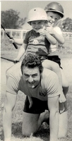 Ryan Warwick (rear) with his brother Brett giving their father Colin a workout