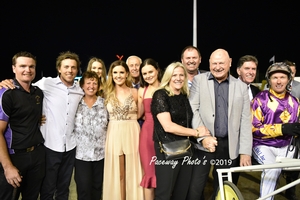 Trainer Justin Prentice (2nd from left) with his mother Debbie and a group of happy owners after the win of Rocknroll Lincoln in the 2019 TABtouch WA Pacing Cup