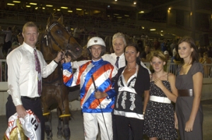 Reinsman Morgan Woodley with the owners of Mysta Magical Mac after the 2009 WA Pacing Cup