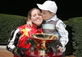 Lisa Miles's son Alfie was required for more congratulatory kisses after his mum won the Vin Knight Medal