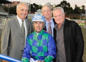 Gino Monaco, Kevin Jeavons and Lindsay Severn with trainer/driver John McCarthy after Washakie's win on Friday night