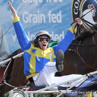 Gary Hall Jnr celebrates as he crosses the finish line. Photo by Gary Wild. 2013 Photograph of the Year