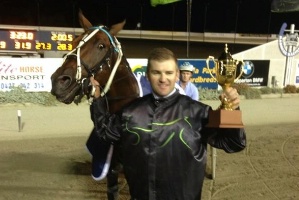 Luke McCarthy and The Gold Ace after winning the Neatline Homes Shepparton Gold Cup