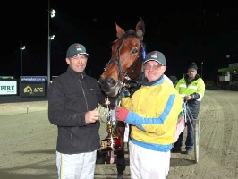 Spidergirl with trainer David Aiken and driver Chris Alford after winning the Vicbred Final at Melton. 
