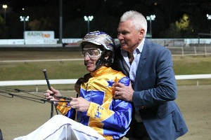 Celebration: Father / Son combination Gary Hall Snr & Jnr embrace following their victory in the Gr.1 $100,000 TattsBet Blacks A Fake at Albion Park