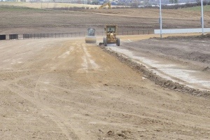 Graders and rollers in the process of building the sprint lane at the new Bathurst Track.