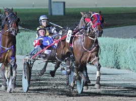 Jason Lee, pictured driving Mark Dennis to victory at Melton, was in fine form at Ararat today with three winners.