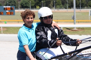 Trainer Gaita Pullicino with Taylah Schembri after the 16-year-old's first winner as a driver yesterday at Warragul.