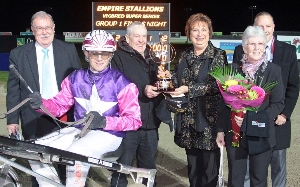 Luke Watson with connections of Flojos Gold at the presentation on Empire Stallions Vicbred Super Series Finals night.