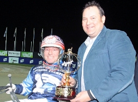 Messini driver Chris Alford with trainer Brent Lilley with the Empire Stallions Vicbred Super Series trophy. 