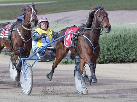 John Caldow drives Sky Petite to victory in the DNR Logistics Trot at Melton.