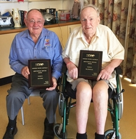 John Brien and Ray Mawhood receiving their Harness Racing Australia awards.
