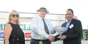 Fred and Elizabeth Crews accept the trophy for the Access Group Solutions Trotters Mile