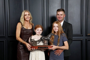 Team McCarthy - Belinda, Madi, Lilly and Luke - accepting King Of Swing's award.