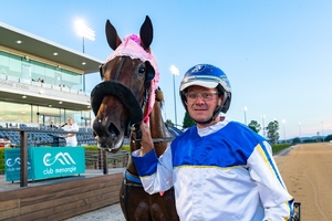 Trainer-driver Rickie Alchin and his unbeaten filly Lux Aerterna.